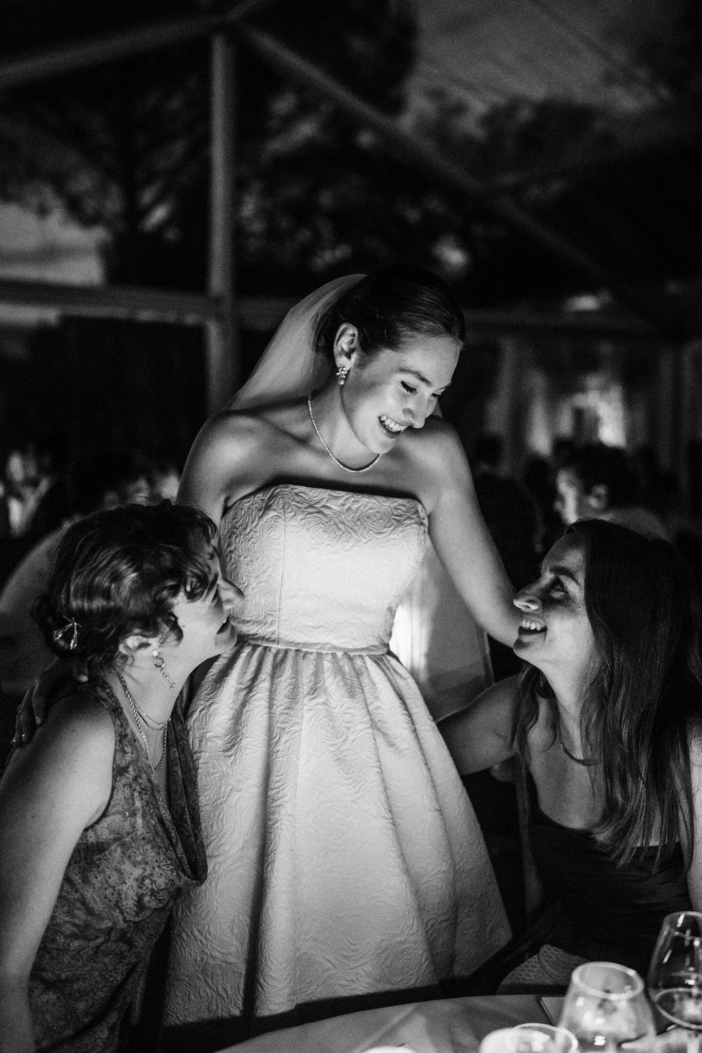 Stylish candid wedding photograph with natural emotion