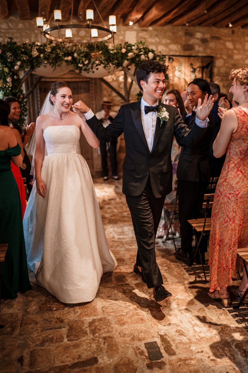 Wedding ceremony exit newlyweds photo idea