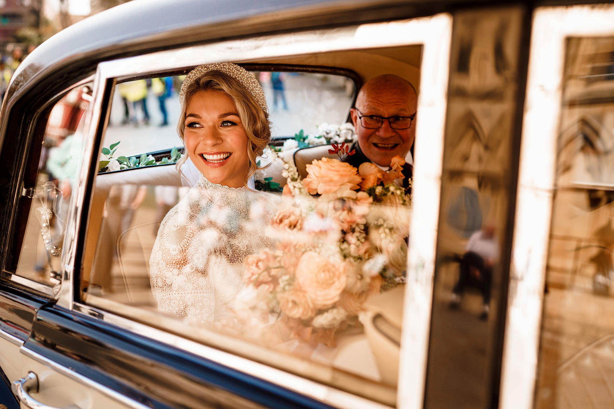 Bride arriving at her wedding in a natural candid photograph