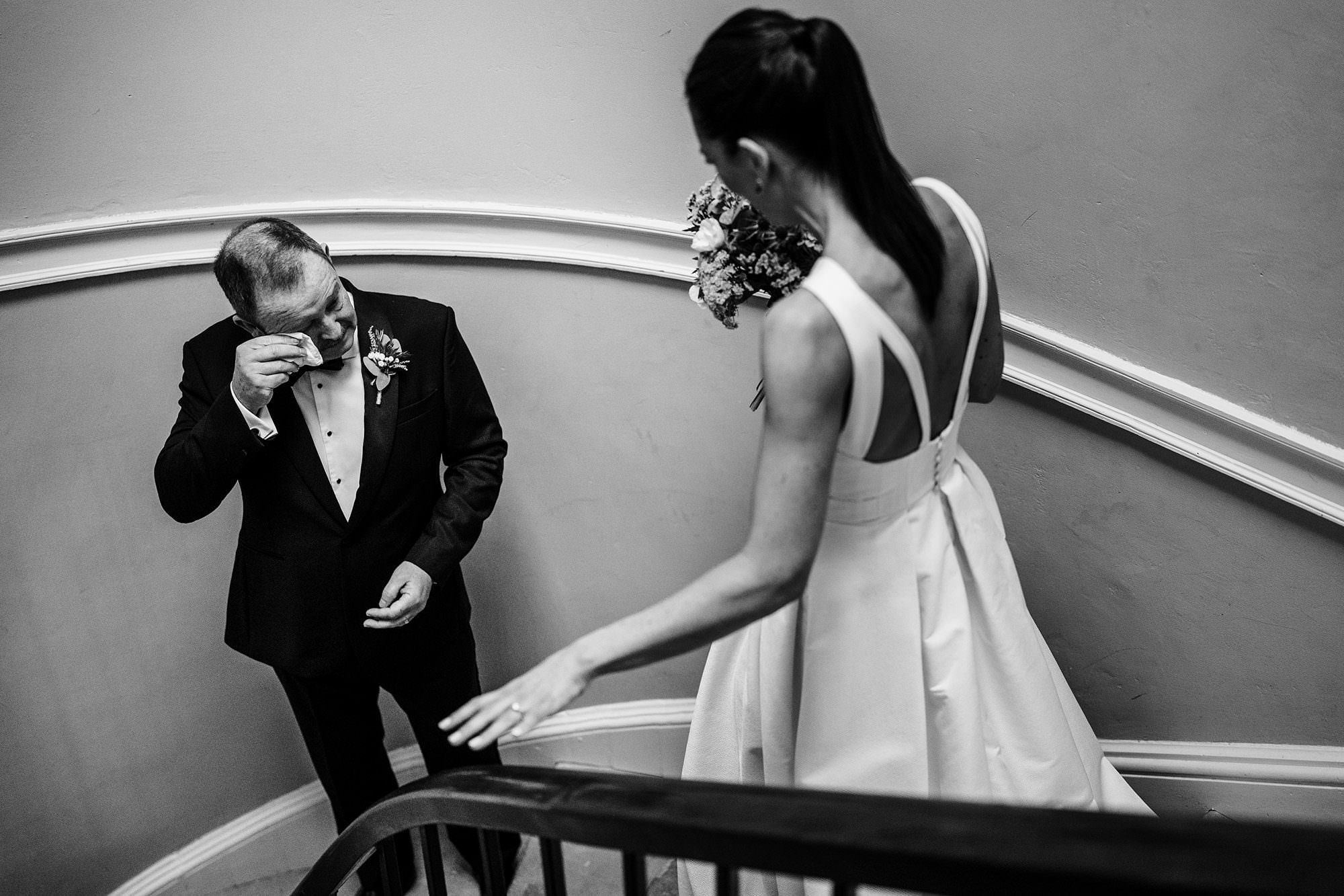 Natural wedding moment photographed in a candid documentary style